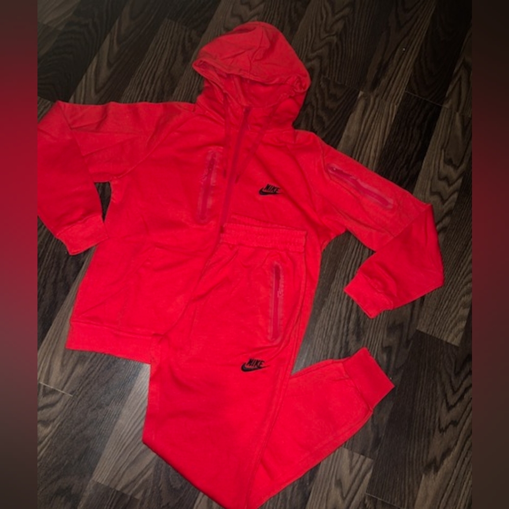 Red and black Nike sweatsuit